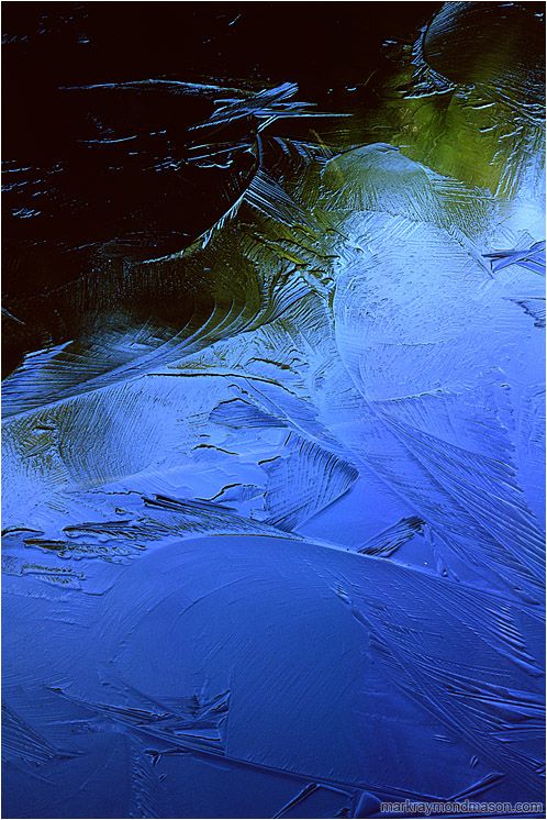 Coloured Ice: Near Squamish, BC, Canada (2003-00-00) - Fine art abstract photograph of colors, shapes and reflections in a frozen lake
