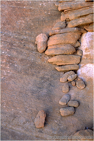 Abstract photograph of eroded sandstone blocks, stacked together in patterns