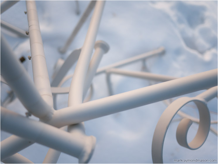 Scrap Metal, Snow: Calgary, AB, Canada (2010-02-05) - Abstract photograph of twisted white metal shapes against a frozen snowy field