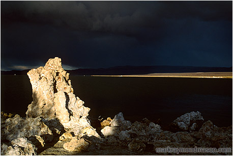 Fine art photograph of a salt tuffa and an approaching storm cloud