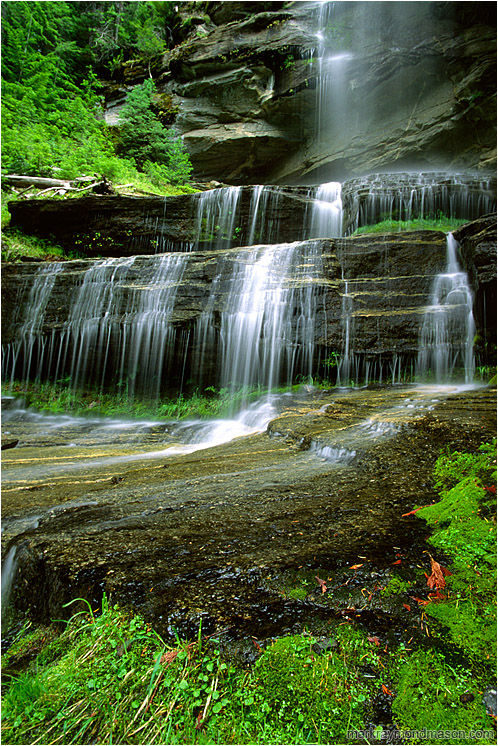Rock Bluffs, Moss, Waterfall: Near Valhalla Park, BC, Canada (2003-00-00) - Fine art photograph of water flowing over mossy rock bluffs