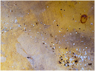 Texture, Flecks, Stains: Near Monte Verde, Costa Rica (2013) - Abstract photograph showing paint flecks, sweeping patterns, and colourful stains in a aging, well-worn concrete floor